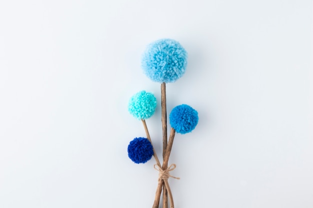 Free photo blue pom poms arrangement above view