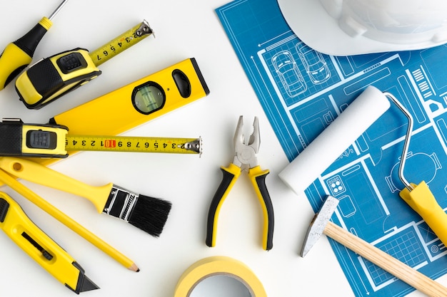 Blue print and arrangement of yellow repair tools
