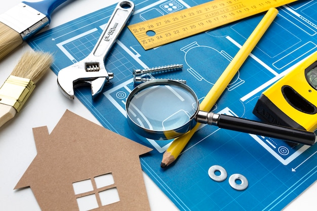 Free photo blue print of a house with a cardboard design