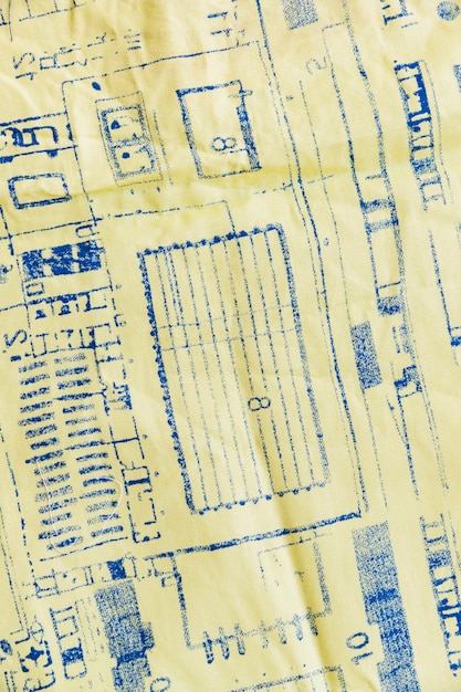 Blue print on yellow textile