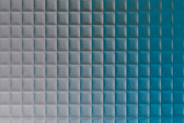 パターン化されたガラスと青い製品の背景