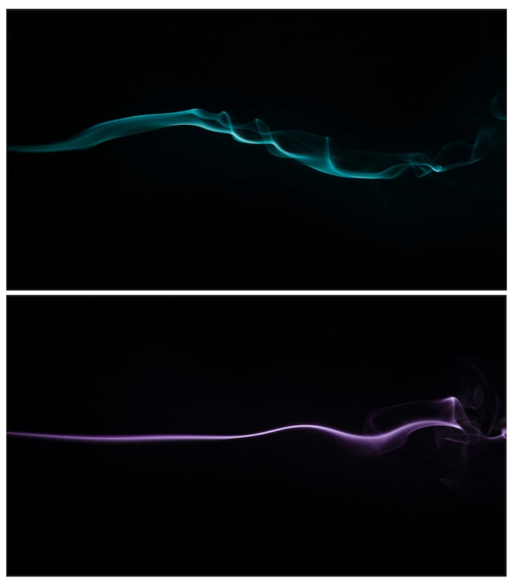 Free Photo blue and purple smoke swirling against a black background