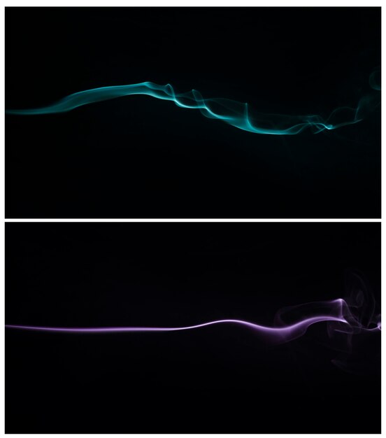 Blue and purple smoke swirling against a black background