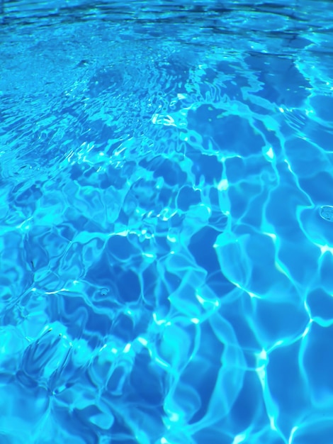 青い波紋の水の背景、水面青いプール