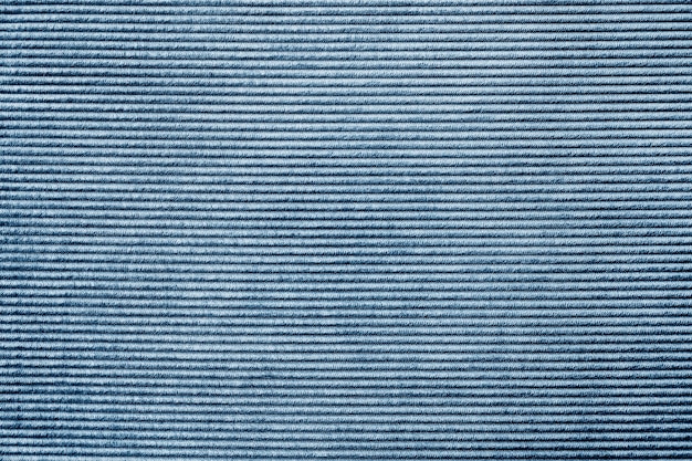 青いじゅうたん生地織り目加工の背景