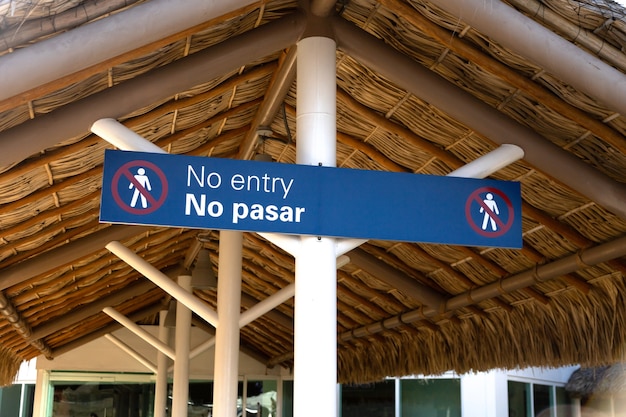 Free photo blue sign with no pasar - no entry - text written on it