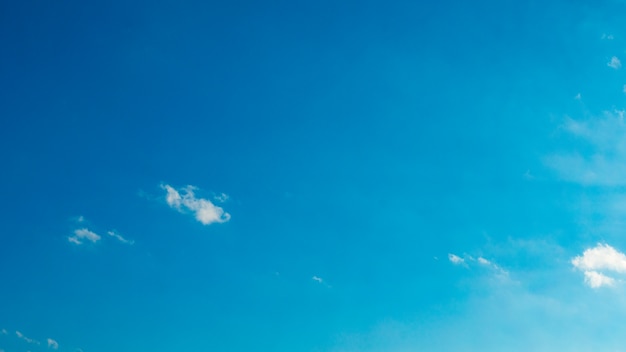 Blue sky with puffy white clouds