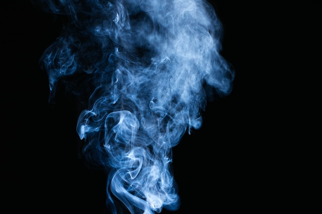 Blue smoke waves on black background