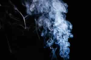 無料写真 黒い背景に青い煙波