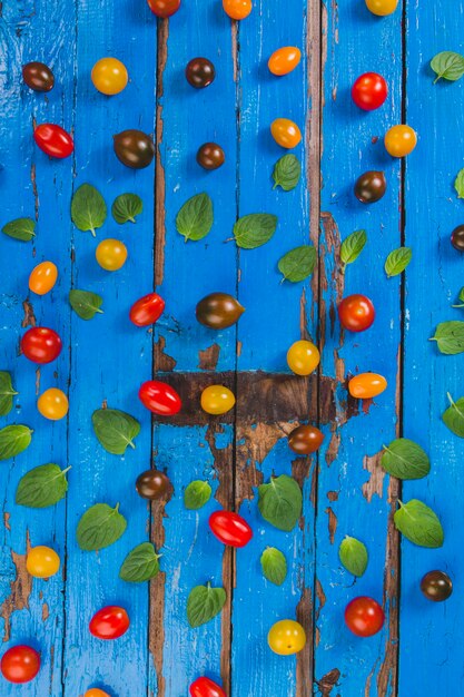 Blue surface with colored summer fruits