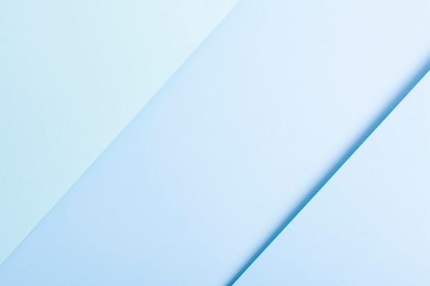 Free photo blue toned collection of aligned paper sheets