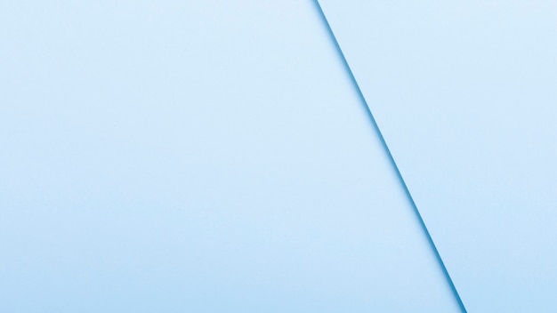 Free Photo blue toned paper sheets with copy space