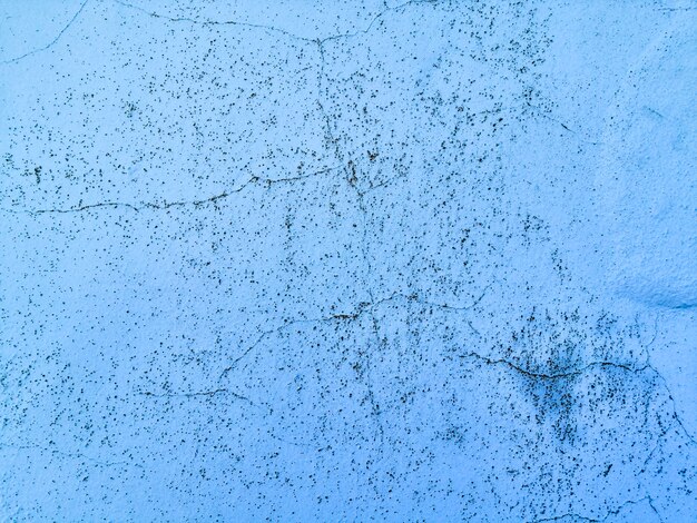 Синяя стена текстура фон с трещинами