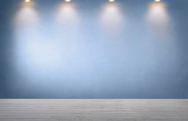 Blue wall with a row of spotlights in an empty room