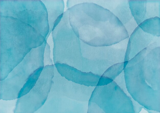 Blue watercolor background with paint stamp