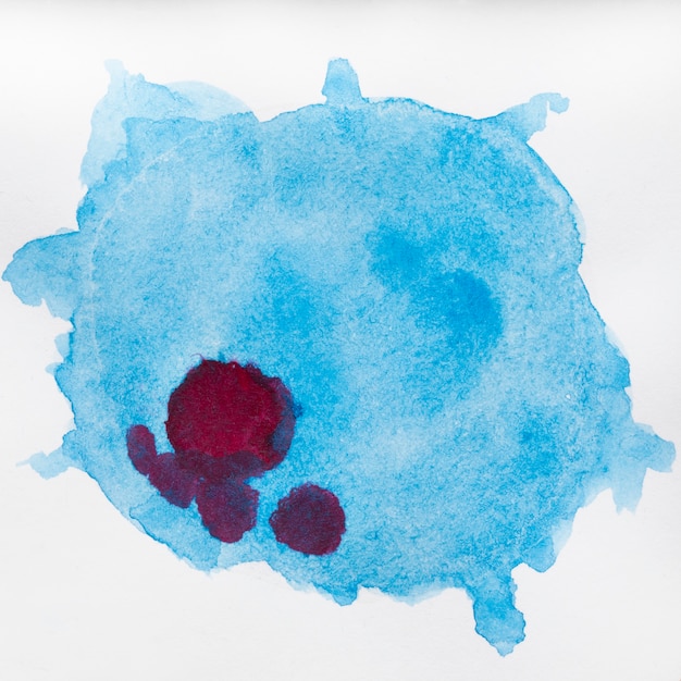 Blue watercolour splash with red stain