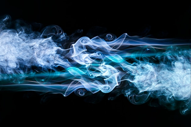 Blue wavy smoke on black background