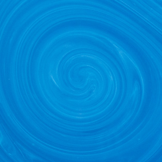 Blue and white swirl color mix fluid art backdrop