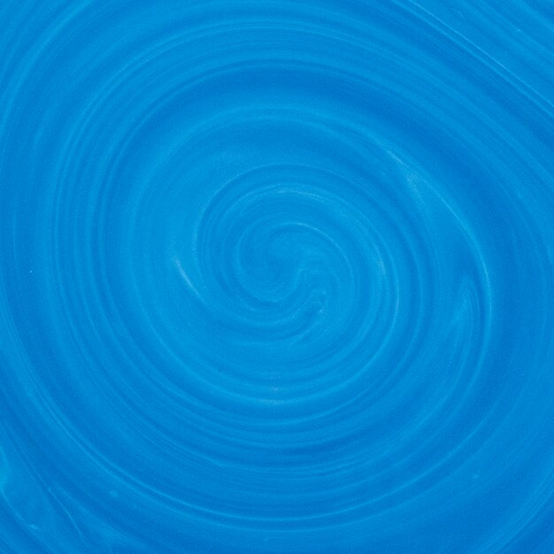 青と白の渦巻き色ミックス流体アートの背景