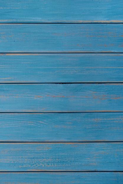 青い木製の背景夏のビーチの垂直