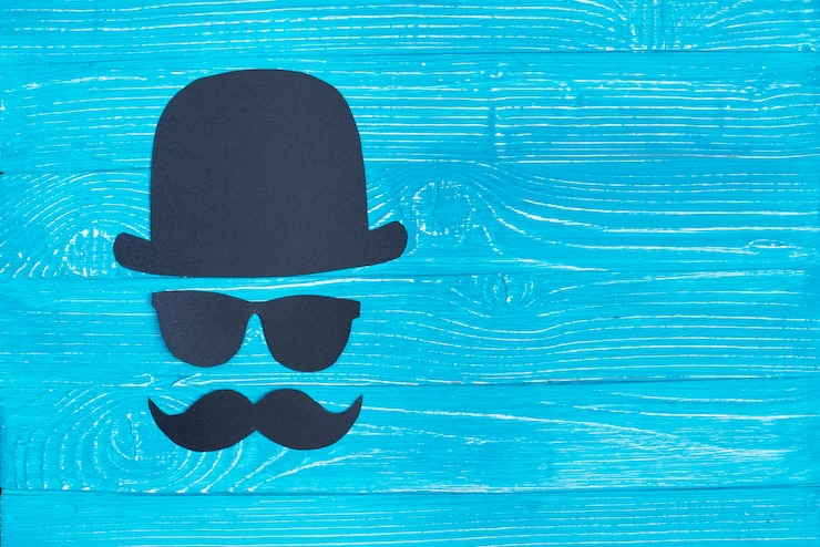Free Photo blue wooden background with paper character for father's day