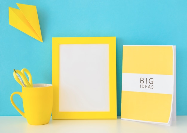 Free photo blue and yellow workplace for creative ideas