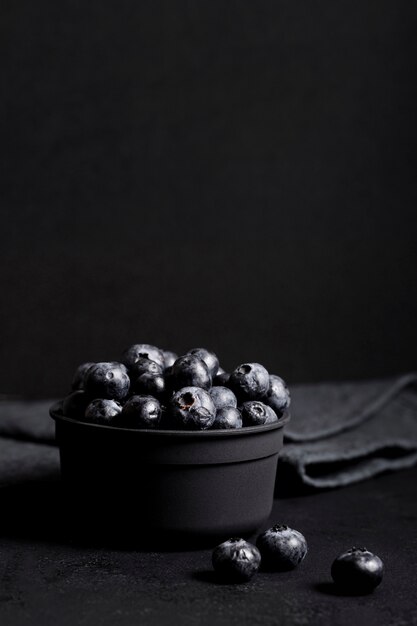 Blueberries in dark bowl