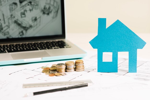 Free photo blueprint and paper house