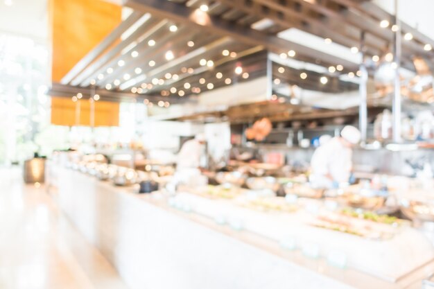 Blurred background of busy chefs