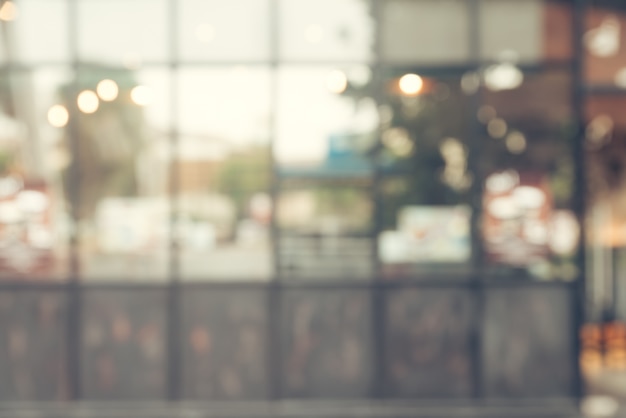 Blurred background - Vintage filter Customer in Coffee shop blur background with bokeh.