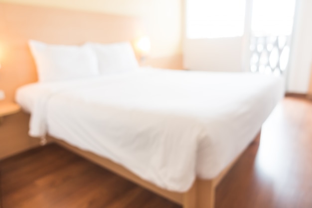 Free photo blurred bedroom with a bed