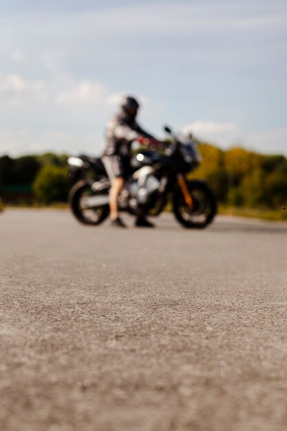 Blurred biker on the motorbike