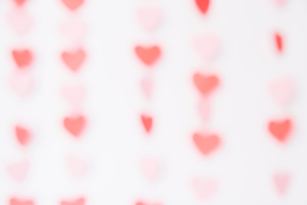 Blurred bright hearts background 