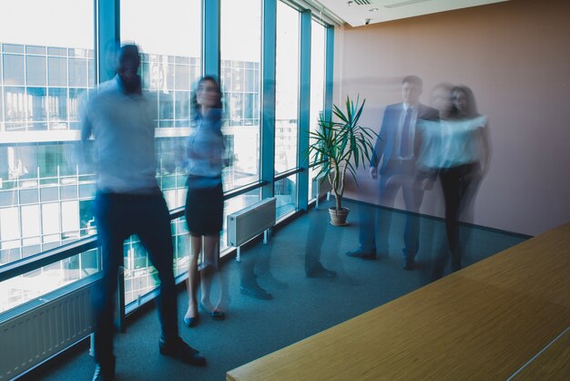 Blurred business people