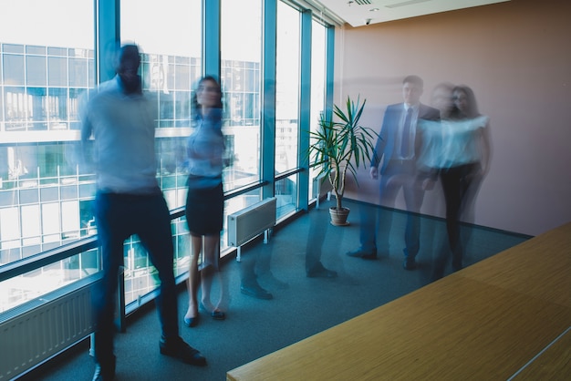 blurred business people