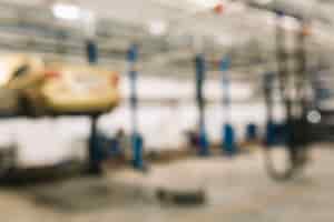 Free photo blurred car repair shop