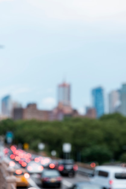 Blurred cars and city skyline