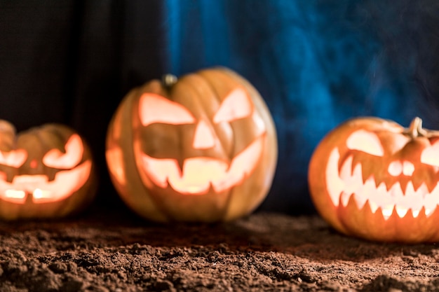 Blurred carved spooky pumpkins