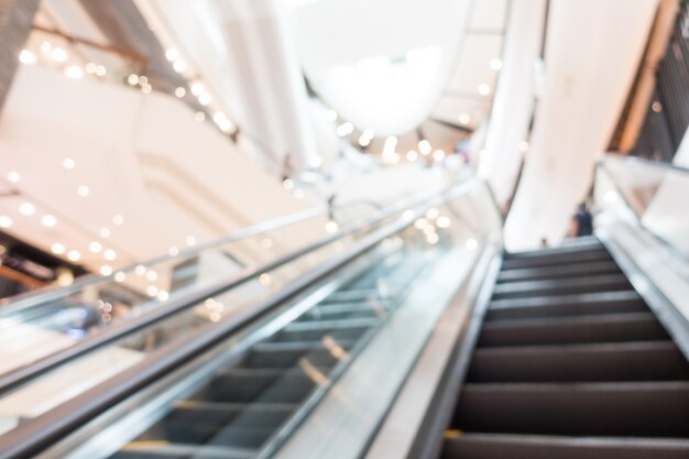 Blurred escalator seen from below