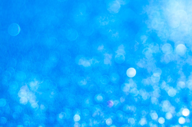 Free photo blurred glitter effect background