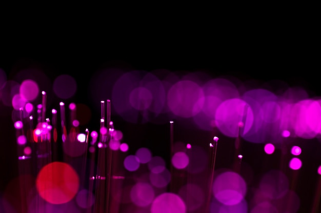 Free photo blurred glowing spots on purple shades