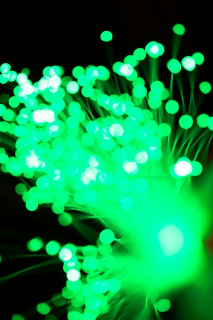 Blurred green optical fiber lights