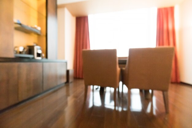 Blurred living room with orange curtains