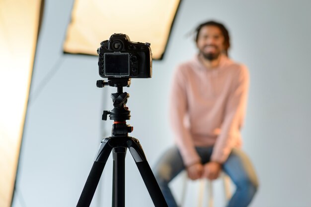 Blurred man sitting on chair