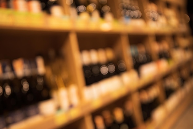Blurred photo of supermarket for your advertising