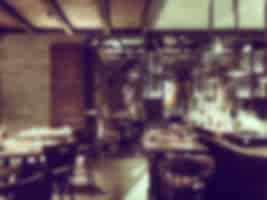 Free photo blurred restaurant with wooden beams