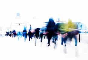 Free photo blurred scene of crowded people walking in a rush