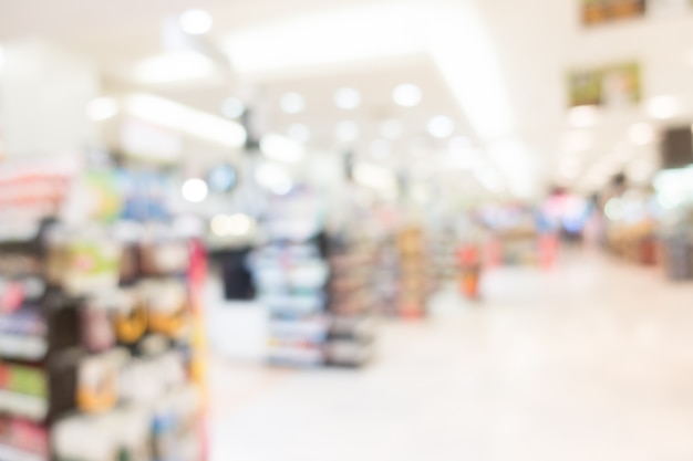 Blurred shopping mall with several stands