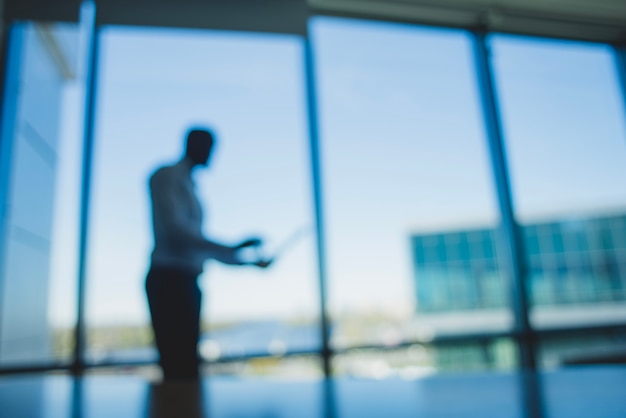 Blurred silhouette of a business man