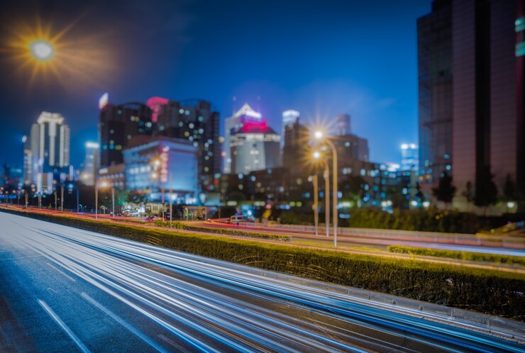 Free Photo blurred traffic light trails on road